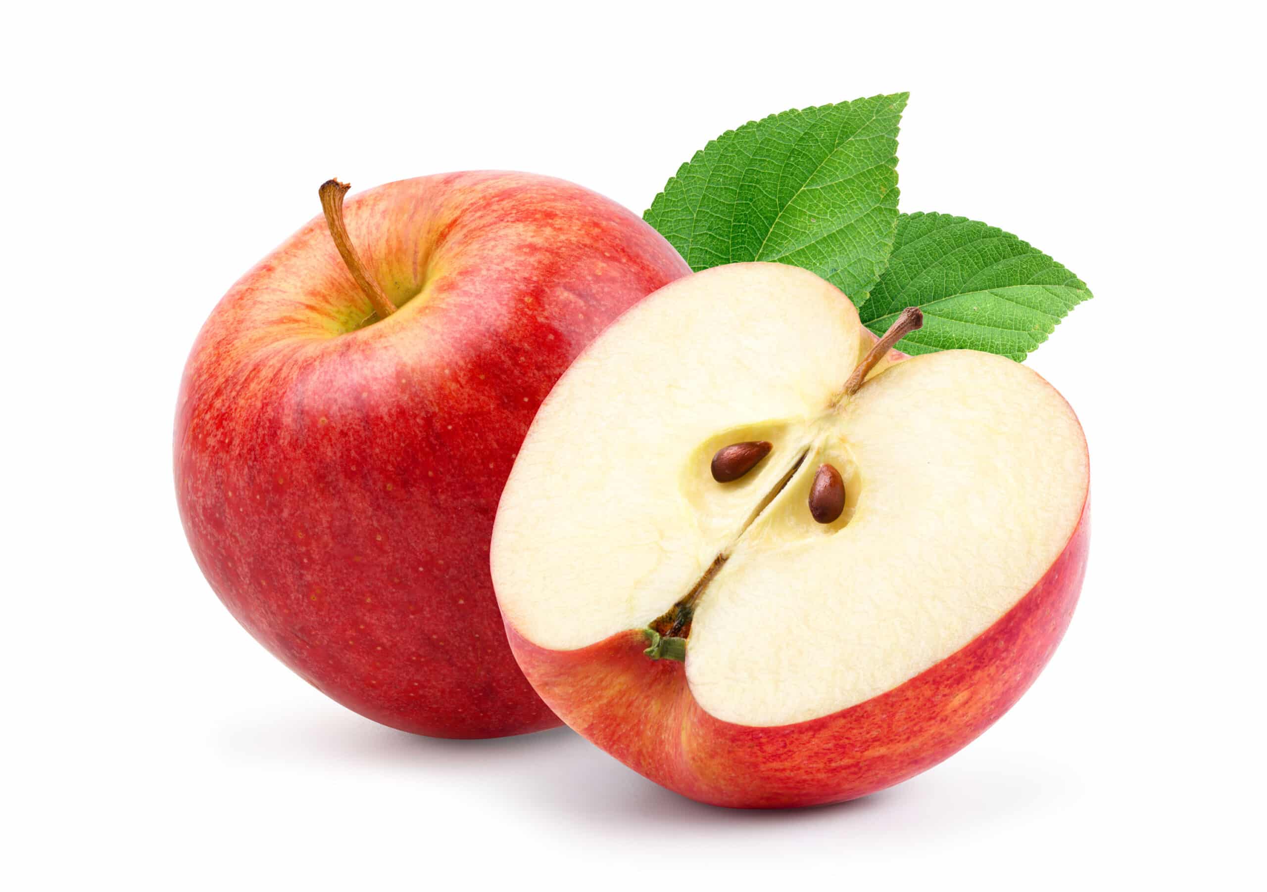 Two apples on white background with one cut in half