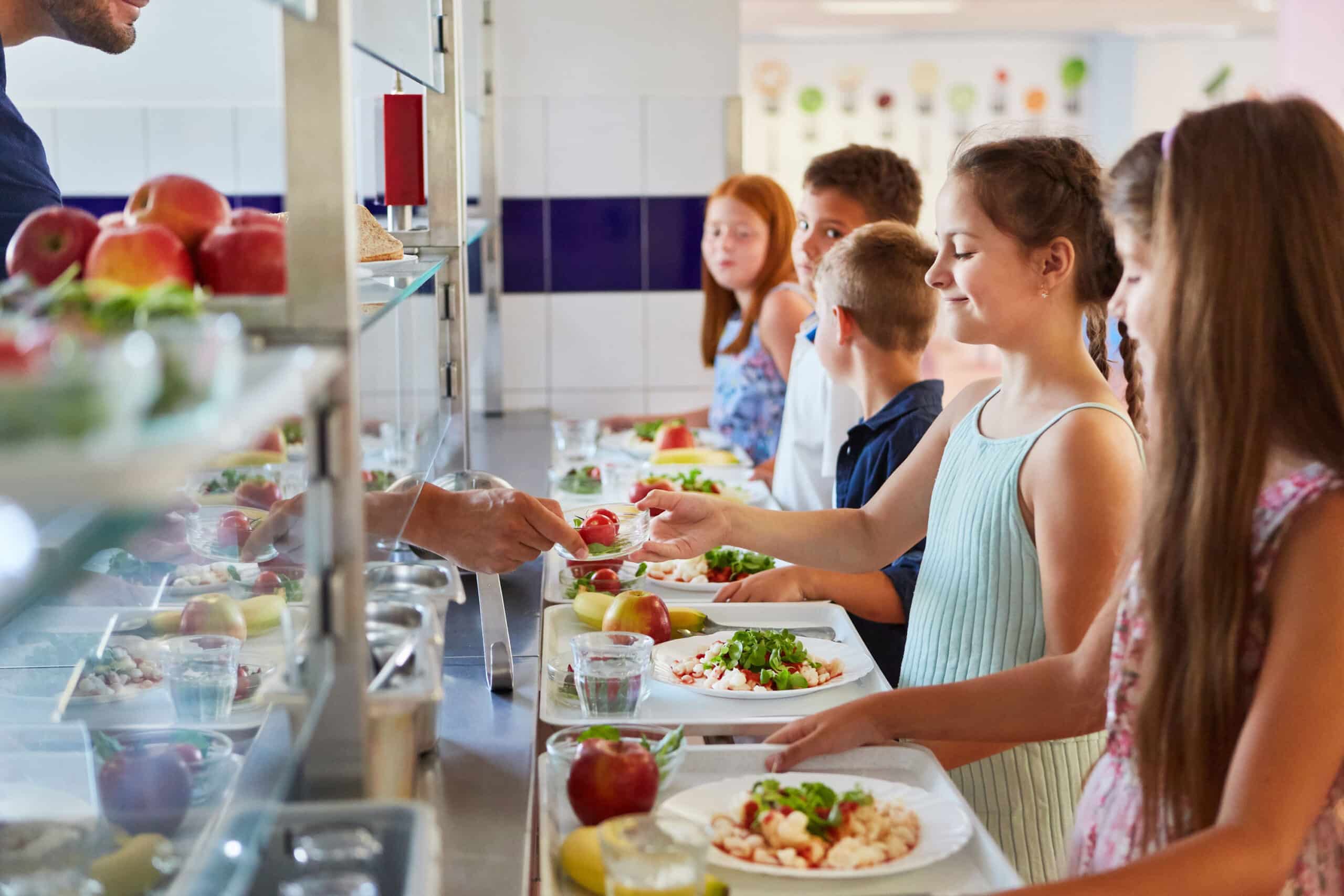 Kids lined up in school cafeteria