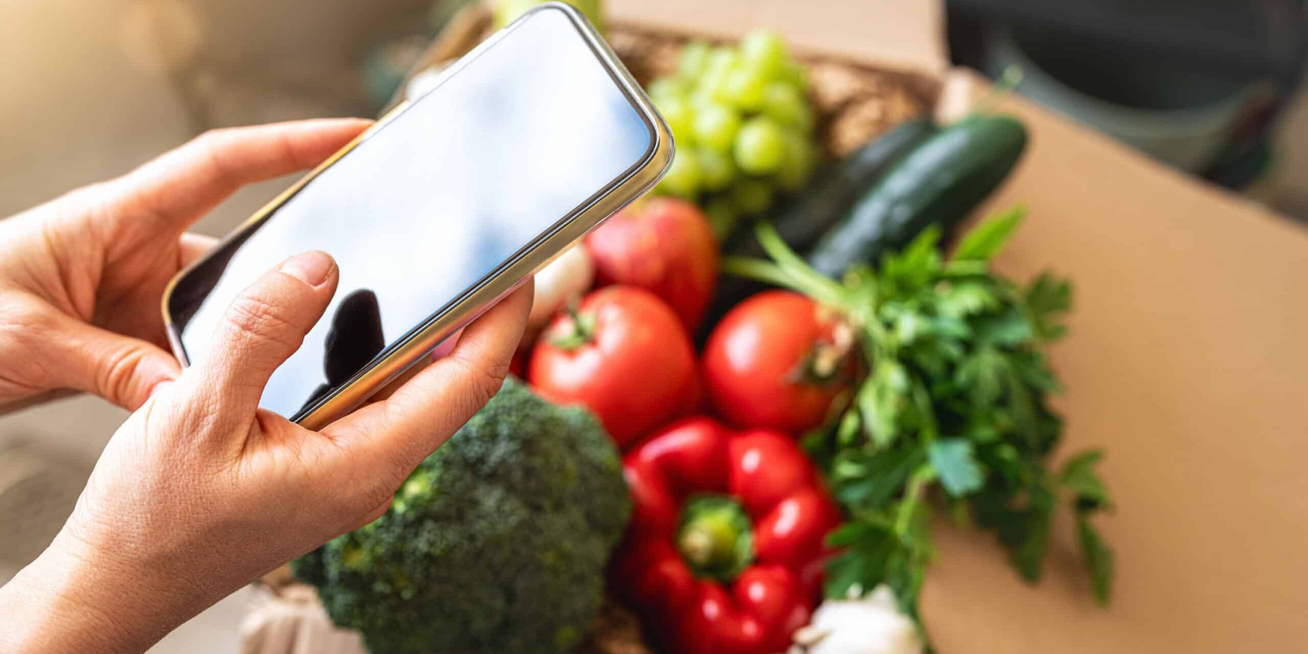 Woman ordering produce with her phone
